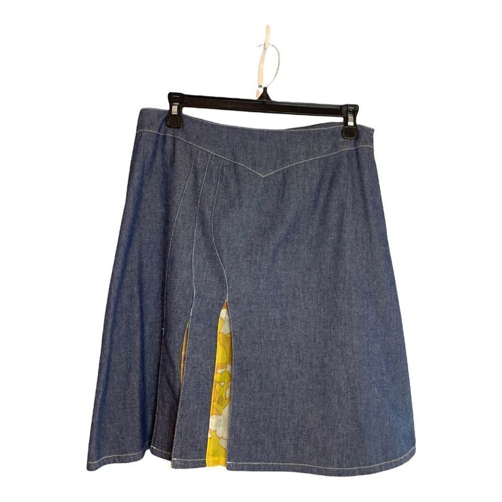 Denim skirt with fabric patterned pleats